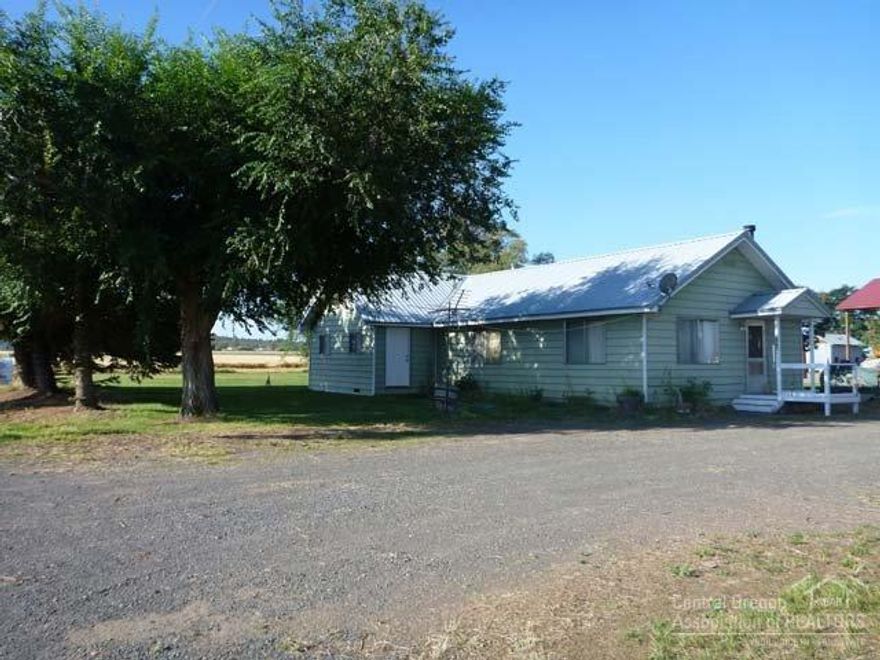 Great farm opportunity in Culver area. What more could you ask for? High production ground, Cascade views, farm ground and rolling hills to the south & east. Home has several new upgrades. New 36X48 shop with 2 car and RV parking, also a 12X20 enclosed parking and storage. There is a custom 900 SF finished loft in the second story of the shop. Mature orchard, easy access to town and schools. Several other storage buildings, building site for your dream home (check w/County Planning) Fenced pasture.