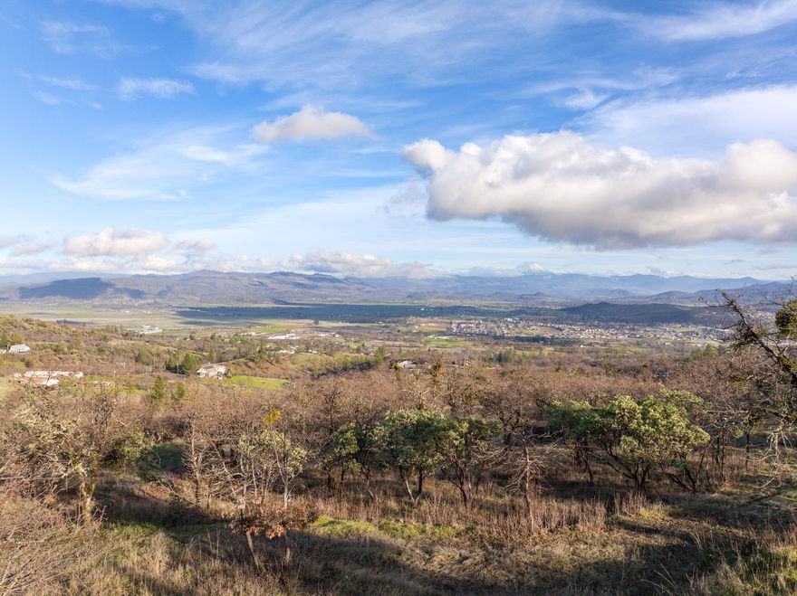 Build your dream home on this exceptional 5.08-acre residential lot offering unobstructed views of Mt. McLoughlin. Situated on a quiet paved road and surrounded by attractive homes, this property provides the ideal blend of privacy, rural living, and convenience. The gently sloped terrain offers a usable and buildable layout, giving you flexibility in home design and site placement. Set within a classic oak savannah landscape, the land features scattered mature oaks with the potential to create a park like setting. Enjoy incredible vistas overlooking Eagle Point, along with the quiet, natural setting that makes this area so desirable. Whether you're envisioning a custom residence, a serene retreat, or a property with room for outdoor living, this lot offers the perfect canvas to bring your vision to life.