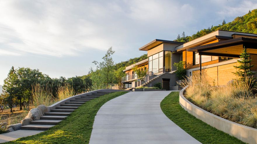 This LEED Platinum modern minimalist home built by Green Hammer™ is one of the most energy efficient and environmentally conscious homes on the West Coast. Set on 9 acres with majestic views of the Cascade Mountains, the home lies only a half mile from Lithia Park and a mile from the Ashland Plaza. Bulthaup kitchen, Gaggenau/Miele appliances, dumb waiter, wide-plank solid black walnut flooring, reclaimed teak cabinetry, Unilux 3-pane windows, whole-house RO water filter, Bodart & Gonay fireplace, and much more. 
 
Floorplan includes large great room, living room, 3 bedrooms, 3.5 baths, study, gym/bonus room (or 4th bedroom), dual master closets, yoga/meditation room, e-nook, laundry room, abundant storage, oversized 3-car garage, 2-car carport, and 1,500 sf basement that can be used as a large storage area or workshop. Built using zero-VOC paint, natural wool carpeting, non-toxic materials, and Zehnder HRV to maximize fresh air and minimize exposure to airborne toxins and pollutants.