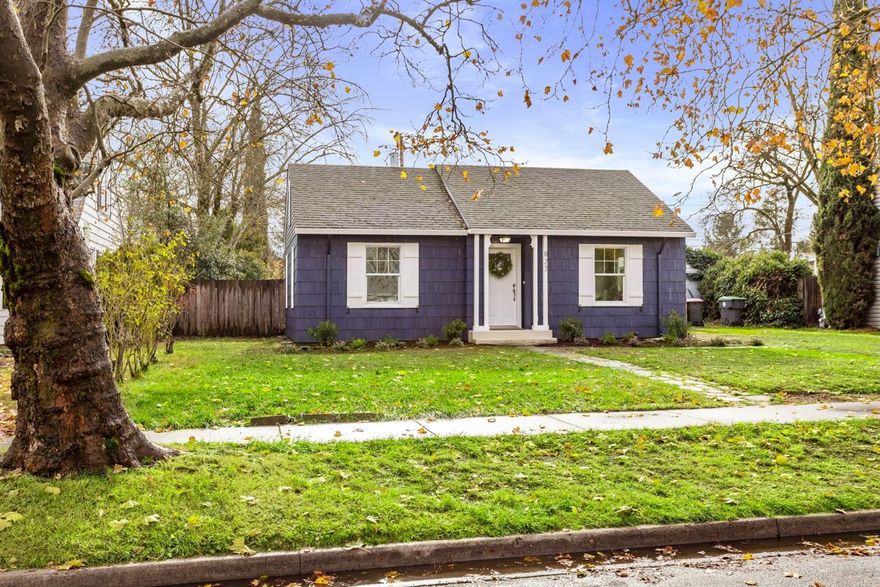 Have you been waiting for the cutest Gingerbread House on Quiet Tree Lined Street? Well this is it and it has been fully remodeled!! Do not be deceived by the Square Footage as it lives much bigger and there is a 125 sqft finished attic space not included in sqft. Big backyard with alley access and oversized single car garage. Updates include: new paint inside and out,new Ductless HVAC,new Stainless Steel applicances, all new lighting, all new switchs/outlets, all new door handles and hinges, new Hot Water heater, new garage door,new carpet, refinished hardwoods, new gutters on garage. The bath has been completely renovated with new tub, new tile surround & floors, new sink,new toilet and mirrors. Seller to provide Home Warranty as well.