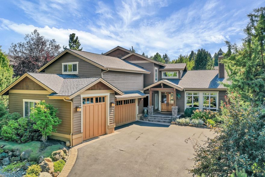 Gorgeous setting near Sawyer Uplands Park with trails to the Deschutes. Ample driveway leading to a finished three car garage, including extra tall door for small RV. Gracious front entry opens to great room layout featuring stone surround gas fireplace. The open plan dining space and kitchen with a walk-in pantry, and tons of counter space make entertaining easy. Sliding doors from the great room and main floor master bedroom bring the outdoors in, and the downstairs is wired for sound inside and out. Low maintenance meticulously landscaped yard offers privacy and is fenced for kids, pets, etc. A den with French doors, lovely powder room, lots of storage and laundry room with a sink and window round out the main floor. Upstairs, 3 more bedrooms with ceiling fans and built-in desks share two full bathrooms. A large bonus room offer lots of possibilities for work or play. In the last 2 years, new furnace and hot water heater. Meticulously maintained. A must see.