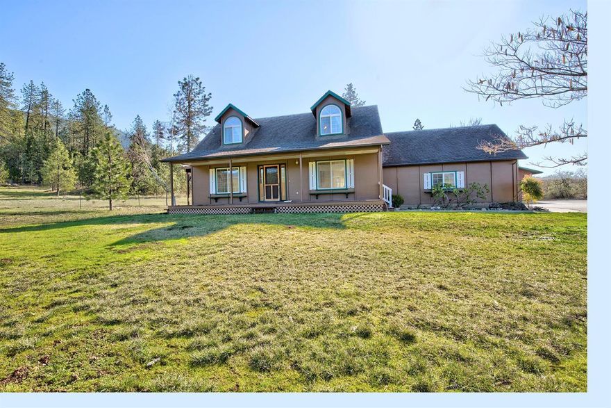 Majestic mountain views surround this perfect mini ranch! Paved drive leads to attached 2 car GARAGE and detached SHOP that is plumbed for a full bath, 220 elec., insulated, & drywalled! The hobby BARN is great for a couple of critters, chickens, etc., w/fenced pasture. Plenty of space on mostly level acreage, to garden, ramble, roam, and run free. This CHARMING HOME is comfy and has new paint inside and out! The upper level is devoted to a generous MASTER SUITE, the perfect RETREAT, light & airy w/dormers & built-in storage plus space to relax or use as office. You will also find a walk-in closet, newly built private deck, Master Bath w/dual vanity, tub, separate shower and skylight! All of this has been lovingly maintained & is MOVE IN READY! Call today for your private tour before it is gone! Listing Agent is related to Seller