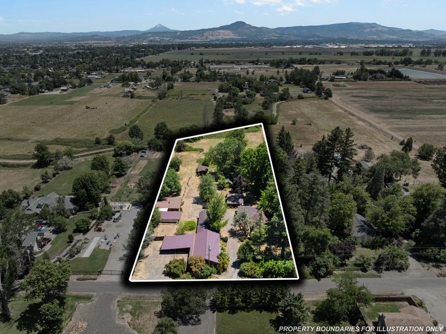 Discover the perfect homestead in Central Point on 2.5 flat, irrigated acres. Ideal for animals, farming, or raising a family. All just minutes from town. The main home offers 4 bedrooms/2 baths, over 2,200 sq.ft., plus a cozy living room and sunroom. A legal 875 sq.ft. guest house with its own address features 2 bedrooms/2 baths and a full kitchen. An attached 630 sq.ft. unit includes a kitchen and laundry and brings in $1,150/month in rent. There is also a charming 360 sq.ft. art studio with a kitchenette, bath, and serene views of the irrigated fields. Fenced pastures, a 3-stall barn with a track room, and a spacious chicken coop complete this rare country retreat.