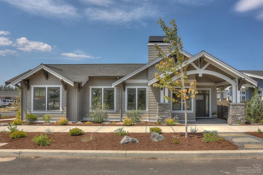 This gorgeous, single level home in NWX is less than a year old and in PERFECT condition!! Wonderful floor plan with nice separation between the master and other 2 bedrooms creating a U shape around a large, fully fenced, paver patio with Southern exposure and low maintenance landscaping. Quality materials throughout including quartz counter tops, Jenn Air appliances, hardwood floors, LED lighting, and barn doors. Located only 1 block from Discovery Park and close to the business hub of Northwest Crossing.