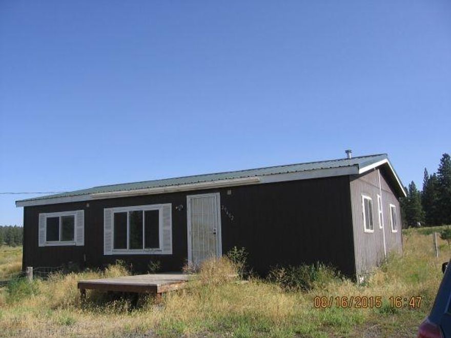 Perfect For The Horse Lover! Home Is 2 Bedroom, 2 Bath With An Office Or Den. Level 2+ Acre Lot Partially Fenced. The Fence Posts Remain On The Rest Of The Acreage And Just Need The Fencing! Storage Building For Supplies And Hay And 3 Stalls For Horses. Property Lies In A Valley With Beautiful Views Of The Surrounding Mountains. Gorgeous Sunsets! Home Needs A Little Tlc But A Great Buy At This Price.