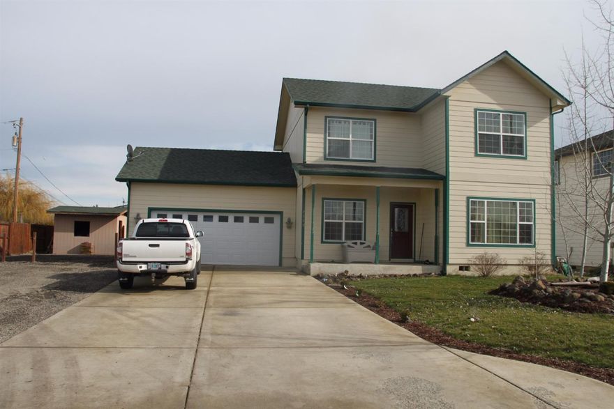 Come tour this very well maintained 3 bedroom 2 and 1/2 bathroom home on a large lot with great RV parking. This home has a nice open floor plan with new carpet throughout there are 2 separate living areas downstairs as well. This home is very spacious. There are tile floors in the kitchen, dining area and bathrooms. In addition to the new carpet the seller has brought in new topsoil and is planting new grass in the backyard and also installing new fencing in the backyard as well. The master suite is very spacious with a walk in closet and a double vanity in the master bathroom. Outside there is a nice patio to enjoy the mountain views to the East, a Storage shed and the RV parking is big enough for 2 trailers. You will not want to miss out on this great buy.