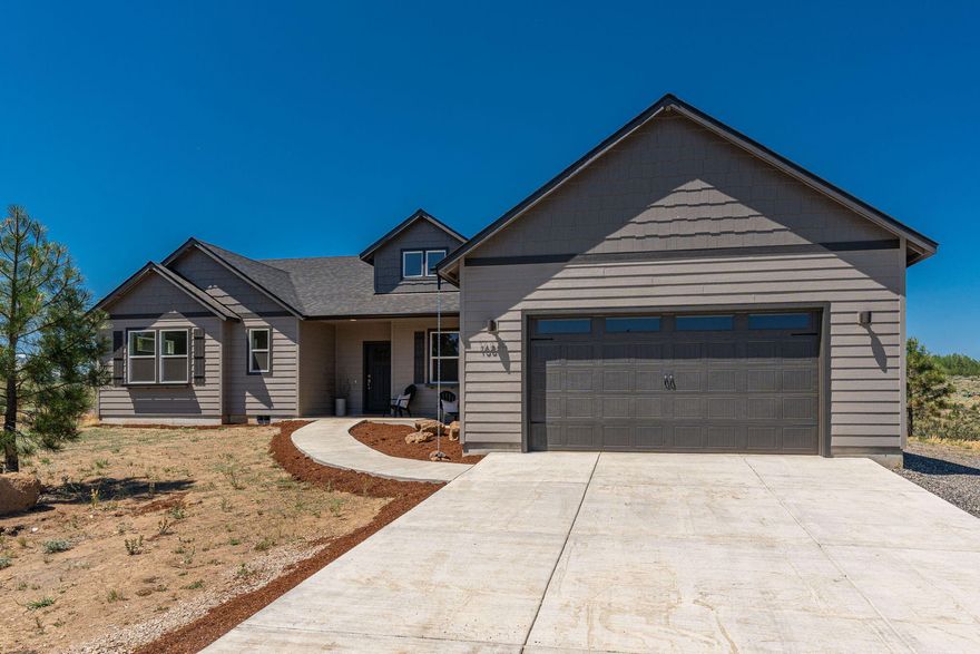 Discover your dream home on 4.62 acres with permanent views of the Three Sisters, Black Butte, and Mt. Jefferson. This single-level, new construction, 4-bedroom, 2.5-bath home includes an office or playroom and a thoughtfully designed floor plan. Enjoy 2,486 sq ft of beautifully crafted living space with breathtaking mountain views from multiple rooms. Take advantage of the $20,000 landscape credit to create your perfect outdoor oasis. Ideal for adventurers, the property features RV parking and hookups, and a 400-amp electric panel, ready for your future shop, ADU or barn. With no HOA or CC&Rs, you have the freedom to customize the property to suit your dreams. Located less than 6 minutes from the charming western town of Sisters, Oregon, you can enjoy local shops, dining, and community events. This brand-new home offers the perfect blend of modern living, natural beauty, and unlimited potential. Don't miss this incredible opportunity!