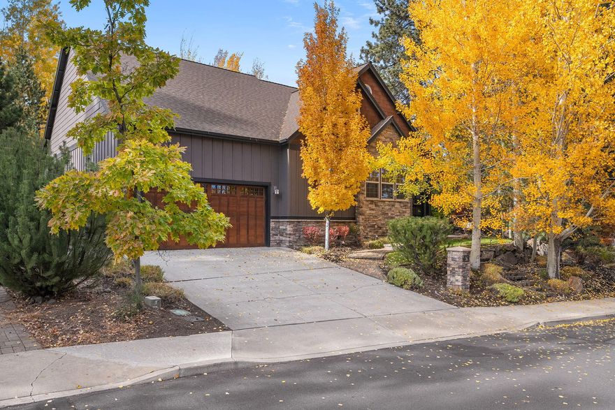 Experience single-level living in River Rim with this beautifully maintained 3-bedroom + office home—a serene retreat with Bend's outdoor lifestyle at your doorstep. This home's stellar location offers access to River Rim's extensive trail network, which leads to Wildflower Park, Sunset Hill, the Deschutes River and the River Trail, as well as nearby restaurants & shopping at Brookswood Plaza. Built by Hendrickson, this home showcases superior craftsmanship and quality finishes including 8-foot solid wood doors, wood trim throughout, built ins and exposed beams in the living room. Hardwood floors gleam throughout the main living areas. The kitchen is designed for both style & function—featuring a large island overlooking a great room with gas fireplace, vaulted ceilings, and a dining area tailored for everyday life or entertaining. Step out to your charming backyard, where a large paver patio, soothing water feature, & professionally landscaped grounds provide a private outdoor haven.