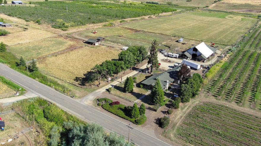 Multi-family potential with non-expiring home site situated on 43.90 acres zoned EFU, approx 32+ irrigated acres with southern exposure. Great property for horses or vineyard. 3 tax lots, TL #1401 has the non-expiring home site. TL #1400 includes all existing improvements including an outdoor arena, round pen, 3,600 sqft barn w/concrete floor, 5 stalls - 2 with turnouts plus other animal shelters. Updated 3/2 single-story home w/ 2,514 sqft . Kitchen features hickory cabinets, tile counters, stainless appliances, including a warming drawer and refrigerator. Primary bdrm has walk in closet, and private bathroom. Beautiful family room with T&G ceiling and wood burning fireplace. Property is completely fenced and cross fenced. New exterior 2023, garden boxes, UV filtration and softener system. 2 heat pumps. Excellent location a mile from 1-5 access & close proximity to Ashland & Medford. Shown by appointment.