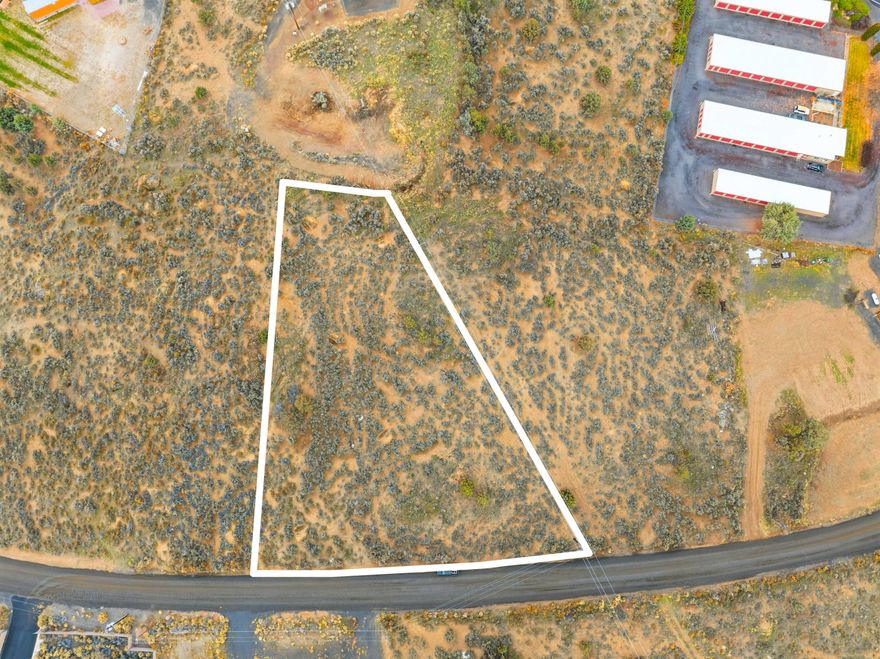 Don't miss this rare opportunity to secure a coveted commercially zoned property in Crooked River Ranch! Great location nearby popular restaurants and businesses. Become part of the growing community while still taking advantage of the many amenities and activities offered by Crooked River Ranch. Property is approved for standard septic, and power and water are both available for connection at the street! Neighboring 1.08-acre Lot 77 is also for sale.