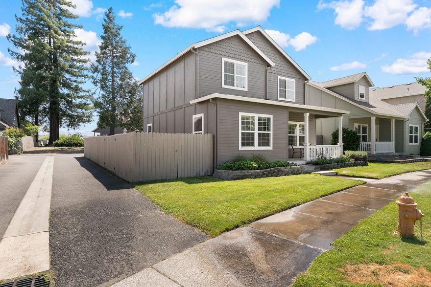 Cute house on a quiet street! Discover this 4-bedroom, 2.5-bathroom home that boasts a convenient Central Point location. Emphasizing comfort and functionality, the master bedroom is thoughtfully placed on the main floor, while three additional bedrooms await you upstairs. The kitchen features a breakfast bar, tastefully refreshed cabinets, and ample counter space to inspire your culinary endeavors. Enhanced by laminate flooring throughout the first floor, this home exudes a warm and inviting atmosphere. The master suite offers a private bathroom with a dual sink vanity, a shower, and a generous walk-in closet. The spacious 2-car garage includes built-in storage shelving, optimizing your storage options. The low-maintenance backyard is designed for easy care, featuring a concrete patio, deck, raised and irrigated garden beds, and even space to accommodate a small RV or trailer. Experience the perfect blend of comfort, convenience, and outdoor enjoyment.