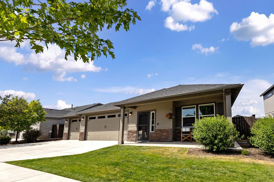 This beautifully maintained NW Craftsman style home is located in the desirable Maple Meadows neighborhood. This 3 bedroom, 2 bath gem sits on a 6,098 SF lot that backs up to community greenspace, offering privacy, serenity and sunset views from your backyard. Step inside to find a spacious and inviting layout with luxury plank flooring throughout the main living area. The chef's kitchen is a true centerpiece, boasting upgraded stainless steel appliances, Quartz countertops, a breakfast bar and plenty of storage, perfect for entertaining or everyday cooking. The primary suite features a walk-in closet and private en suite with double vanity. Enjoy outdoor living with a covered patio, paver extension, mature landscaping and a shed. Extra deep 3 car garage provides ample room for vehicles, toys and workspace. Access to community grenspaces, walking trails, all just minutes from schools, parks and shops.