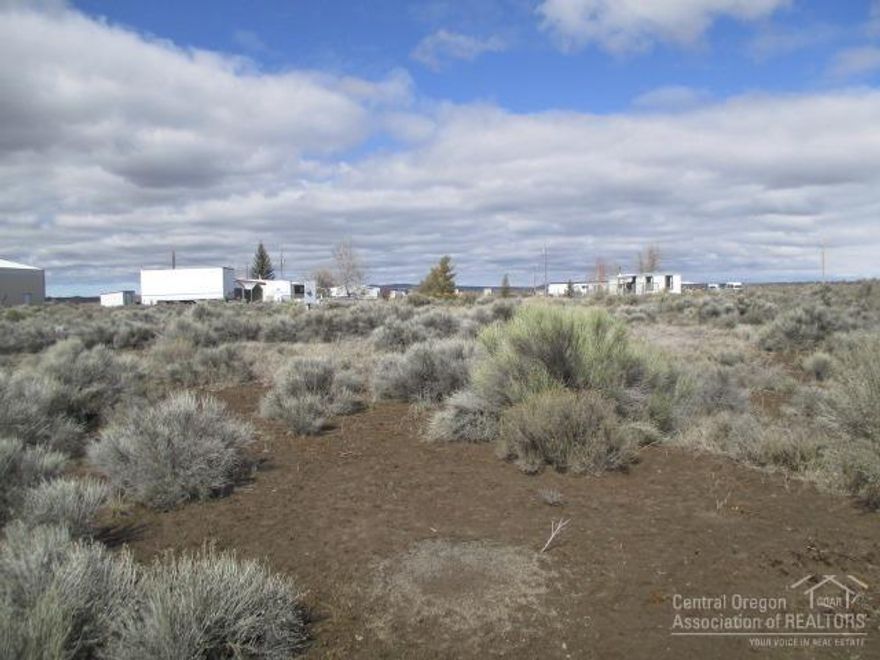 Ready for you to get your building started! About a third of an acre with the power, water and septic on site. Build yourself a little home or have a manufactured home put in and enjoy the high desert. Area is served by grocery stores, gas station, hardware stores, schools (public and private), library, multiple restaurants, credit union, airport, medical clinic, EMT Services, and more.Buyer to do their due diligence.