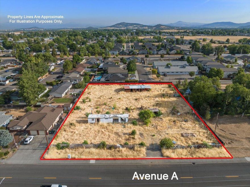 Attention Builders, Developers and investors!! Here's your land for your next project. This is a 1 acre lot zoned WCUR-6 allowing for up to 6 tax lots. Check with the county to explore the possibilities with this property and verity its uses. White City is a booming city, and it's known for its close proximity to outdoor adventures like the Rogue River and Crater Lake-- offering an inviting place to call home. Utilities are on the property or close by. All buildings currently in the property are tear downs.