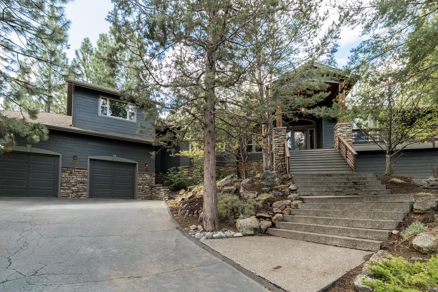 Beautifully updated and private home in NW Bend! Located within the gates of Awbrey Glen, this custom built NW style home has 4 bedrooms, 3 bathrooms all on the main level plus a large bonus room upstairs. The 3582 SF lives large with some separation of the large entry, dining and living room from the kitchen and family room. The master suite, the 4th bedroom and 3rd full bathroom are on one wing of the home while the other two guest rooms and a full bathroom are on the other. Be sure and check out the Matterport 3D Tour to virtually walk through the layout of the home. Th extra large lot size is .77/acre which allows the home to sit up above the cul de sac and still have a huge amount of outdoor living and yard space in the back of the home. The garage is a two door bay with lots of added space on either side and extra lighted storage space under the home off the garage. Walk or bike out your door to  all the amenities the Awbrey Glen neighborhood has to offer.