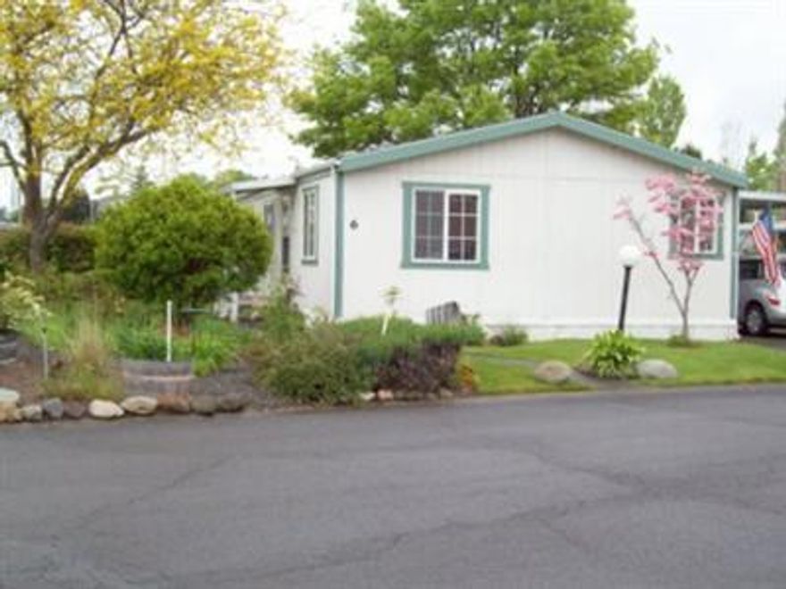 Delightful, newer home in Glenwood Mobile Estates. Open living room kitchen combination. Vaulted ceilings. Built-in hutch between kitchen/ living room. Movable island, pantry and writing desk in kitchen designed with corner windows. Formal dining room with arched doorway to living room. Nice cabinets above washer and dryer. Large storage shed with private back yard. Glen wood Mobile Estates is a 55+ park with large community center, library, new exercise room, laundry and in-ground swimming pool. Home Warranty included in sale. Close to shopping, medical facilities and public transporation