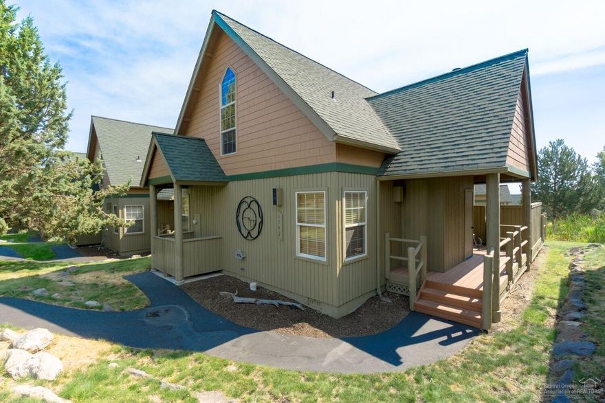 Beautiful Turnkey Chalet. Enjoy the view off the deck while relaxing in your hot tub. This is a must see!