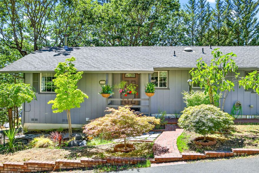 Extremely well maintained updated 3 bedroom 2 bath home in forest setting. Upgrades include Gas Range, Microwave hood, D/W, Refrigerator, Electric fireplace, Gas furnace, central A/C , Hot water heater and a new Roof installed in September 2025. Vaulted ceilings. Vinyl framed double pane windows many of which have high end coverings. Laminate floors throughout.  Over-sized two car garage with work bench. There is a beautiful partially covered wrap around deck with serene views for your outdoor enjoyment. Seller has a 1990 Hornock Hersey Intrepid II wood stove available for purchase if buyer prefers that over the electric fireplace.