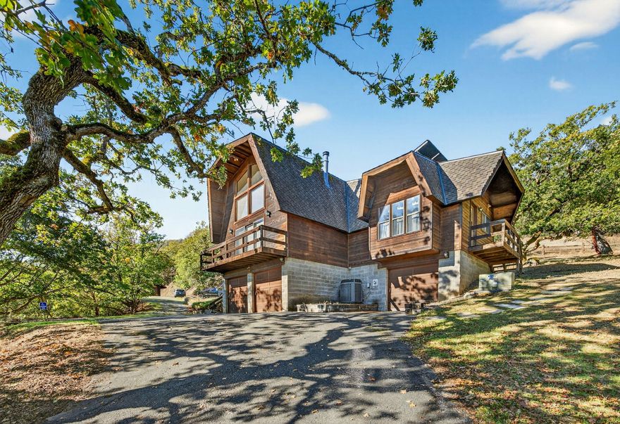 Charming Home on 12.67 Acres, 4 tax lots, Bordering BLM Land
This 1977-built two-story home offers approximately 1,815 sq. ft. of living space on 12.67 acres of serene countryside. The property features beautiful views and direct access to BLM land, just steps from the Rogue River. The home includes three bedrooms with a loft area, and two bathrooms, with one bathroom recently updated. The spacious primary suite is conveniently located on the top level, while two additional bedrooms are on the main level. Enjoy the natural light from large windows that capture the surrounding landscape. A good-sized barn provides plenty of space for storage, hobbies, or animals—making this property perfect for those seeking privacy, outdoor recreation, and rural charm.