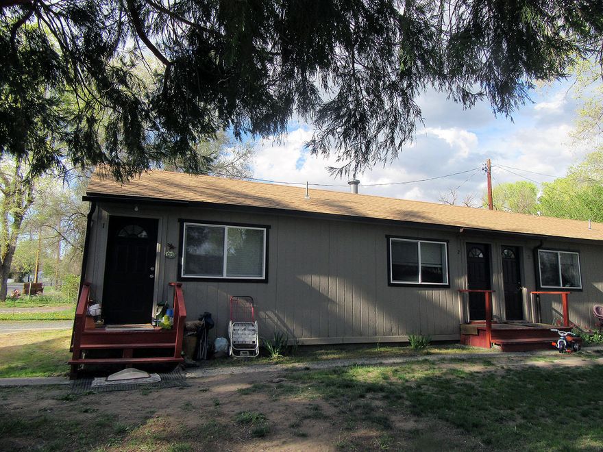 Attention all Investors!  This 8 plex is in good condition with many updates and sits on .38 acres in  the south suburbs. It features a 5 plex, a duplex and a single family home. 6 of the units are 1 bedroom, 1 bath and 2 units are 2 bedroom, 1 bath.  Owner pays water, sewer, garbage,  yard maintenance and some utilities. Separate meters for gas and electricity. Nice trees, cool green lawn for common area enjoyment.  Don't miss out! These are money making rental properties and they won't last long! Price also includes lot next door, subdivision pleasant view tract block 6 lots 5 & SCY 13' of lot 6 tax lot 1000
