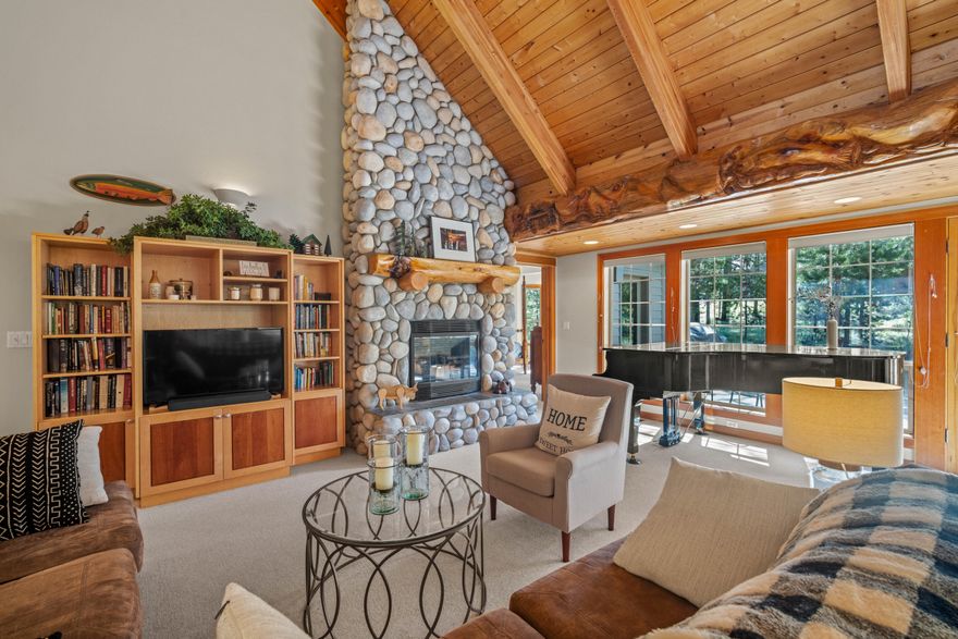 Nestled on the serene Poplar Loop in Sunriver, 28 offers the perfect blend of comfort and convenience, with easy access to Ft. Rock Park, SHARC, The Village, The Woodlands Golf Course, and Sunriver Marketplace. This thoughtfully designed 4-bedroom, 4-bath home boasts an open great room floor plan, highlighted by vaulted ceilings, warm wood accents, and two inviting gas fireplaces—one in the great room and another in the dining area. Set on a gently sloping lot, the private back deck features a soothing hot tub and overlooks the tranquil backyard and common area, surrounded by natural, low-maintenance landscaping. Whether gathering with friends under the starlit sky or enjoying a peaceful morning with coffee in hand, this home captures the essence of Sunriver living. For over 50 years, Sunriver Resort has been a premier destination for golf, skiing, river adventures, hiking, and more. If you've been dreaming of making Sunriver home, 28 Poplar Loop is your perfect retreat.