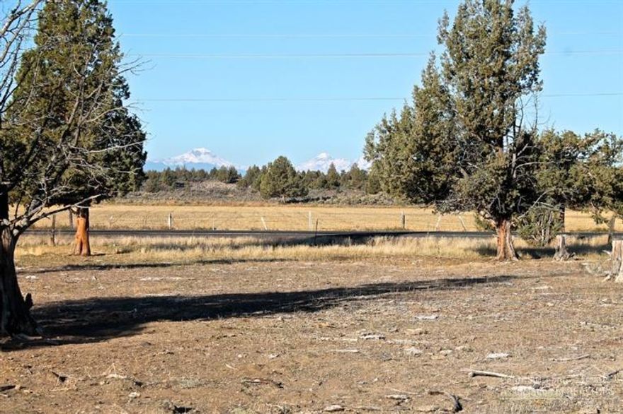 Cascade Mountain views from build-able 39 acres. No CC&R's or HOA's for potential home site. Property is private with Juniper trees and COI ditch meandering through. Close to Brasada Ranch.