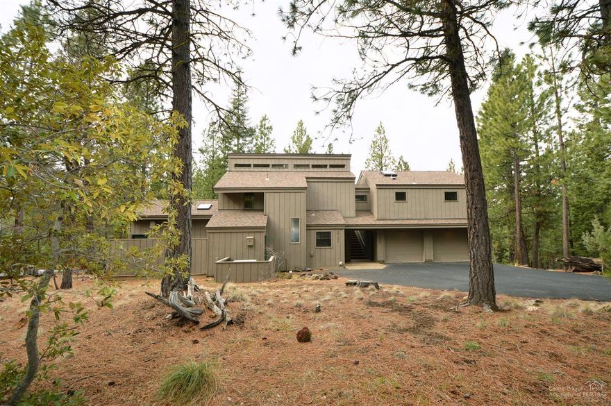 Open floor plan and reverse living provide view of the Forest. Large deck outside the second level facing Northwest. Very close to bike path, Paulina Springs pool and tennis court. Large double garage. Skylights and windows bring the outdoors inside and fill the home with light. LAR paid in full. Current owner remodeled in '79, '84 and '96. This 4 bedroom 3 bathroom is a wonderful retreat in the woods.