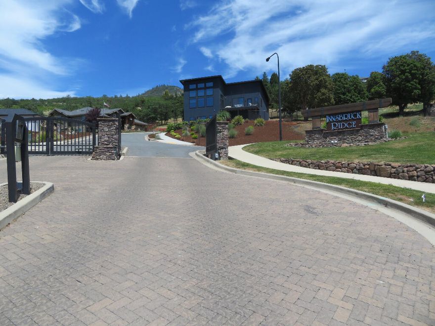 Plan and Build your dream home on an exclusive lot in an east-side gated community. This is arguably one of the best view lots in east Medford with stunning panoramic views including city lights, valley and surrounding mountain views. Lot #25 is a little over a 1/3 of an acre and offers a gentle slope to the street.This lot works great for a 2 story or single level home.  Excellent quiet neighborhood. Besides the privacy this Exclusive Gated Community offers, this lot features an excellent location, just minutes from the center of town, close proximity to medical, recreation and services! If needed, we also have an excellent builder, architect/designer available to help with the design and construction of your custom home.