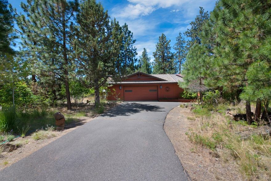 Open light and bright single story home on almost one acre in town situated on a quiet cul-de-sac, 4 true bedrooms and 3 full baths. Gorgeous solid red oak flooring, updated bathrooms. French doors. Great separation of space for the bedrooms. Covetable 0.78 acre lot with a large deck overlooking natural rock formations, several garden areas and substantial landscaping including fruit trees. Over-sized garage with shop area. RV parking. Tiled roof & invisible fence.