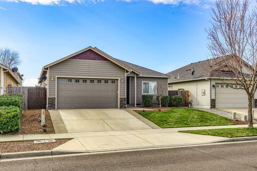 Lovely single-story home tucked away on a quiet street in the highly desirable Candlewood neighborhood. From the moment you enter the home you will be impressed with warm and inviting floor plan. Vaulted ceiling in the living room that is open to the dining room and kitchen, perfect for entertaining. The interior and exterior were recently painted and new carpet was installed. Hardwood floors grace the main living area, kitchen and dining room. The kitchen features warm wood cabinetry, granite counters, pantry and matching stainless appliances. Main bedroom has walk-in closet, dual vanity and door leading to covered patio. 2 additional spacious bedrooms and guest bath leave room for friends and family. Laundry room has additional cabinetry for storage. Covered patio off of the dining area is a wonderful place to enjoy some peace and quiet after a long day. This place is in impeccable condition and is just waiting to welcome you home. Call today for your personal tour.