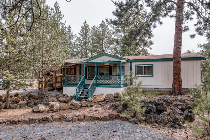 Affordable home on large .23 acre lot in Bend! Mature ponderosas offer low maintenance, natural landscaping. Plenty of room inside this 3 BR, 2 BA, open floorplan home. Dining area with eating bar plus office/extra room and laundry room. Covered carport plus plenty of off street parking that can accommodate an RV.