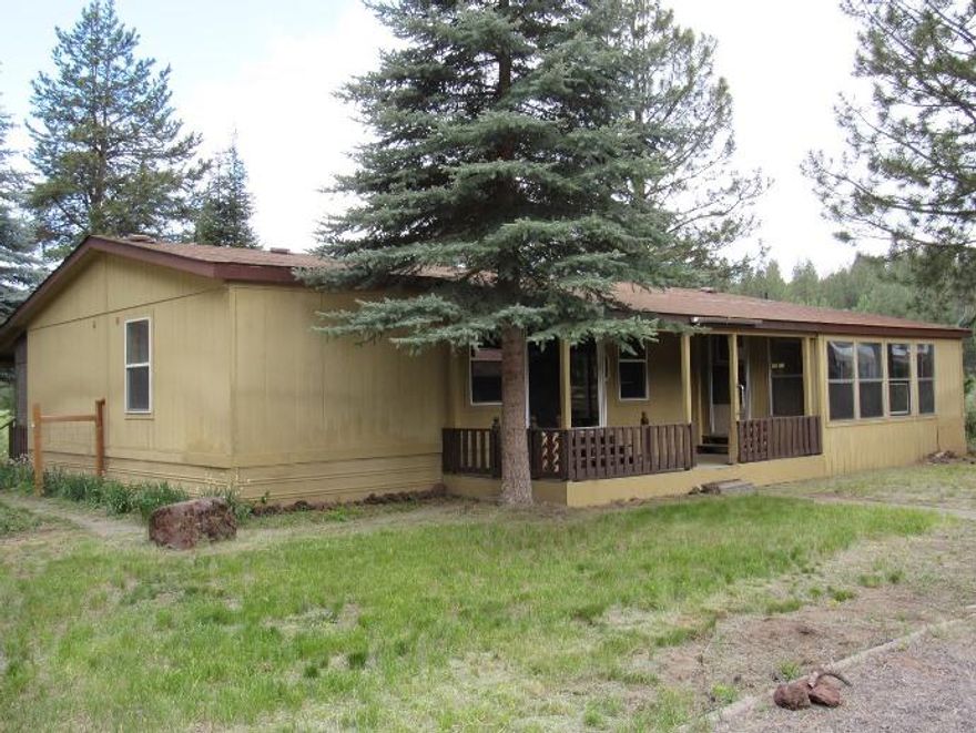 This home has Williamson River frontage in Chiloquin! 3 bedroom 2 bath manufactured home was built in 1991. It has 1296 sq. ft. Plenty of room to enjoy the beautiful view of the river from a nice covered deck. Shop/garage has 1280 sq. ft. and there is a greenhouse. 1.02 acres. This property may qualify for Seller Financing (Vendee)