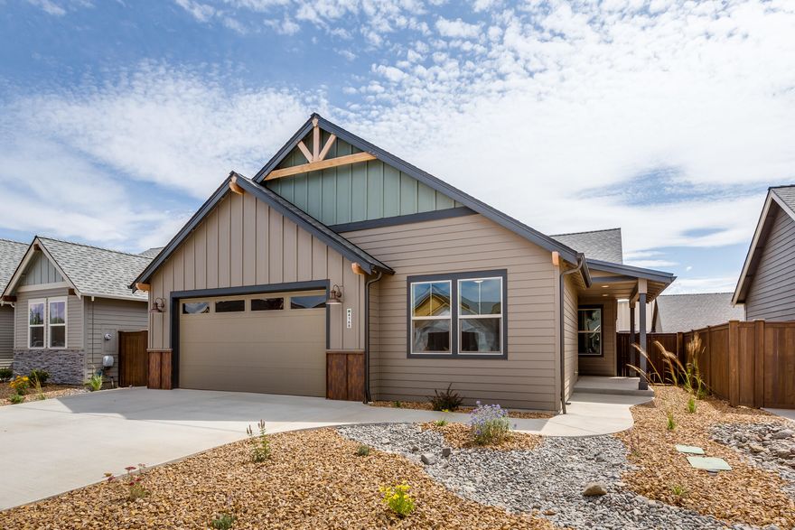 Welcome to Prairie Crossing, a neighborly well-designed community distinguishing itself from the ordinary. A community not only built with quality, but efficiency. Accepted offers will include a 3 year Energy Bill Guarantee. The Sedgewick is a single level 3 bed, 2 bath or 2 bed with den/office floorplan. Master suite separation with floor to ceiling tile and heated floors. Like all homes in Prairie Crossing home includes landscaped front and back yard, fully fenced with covered back patio. EA Certified, Central AC, tankless hot water tank with recirc pump,  hard wood floors, 9' - 10' ceilings, 8' front door. Fully finished garage and so many more details. Community Park, Pavilion and Dog Park. See the difference at Prairie Crossing!  Directly N of Ridgeview HS and W of Canal.