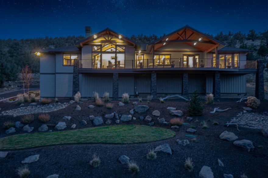 Gorgeous single-level custom home with stunning views of the Cascade Mountains and Smith Rock in Eagle Crest Resort! Built with exceptional craftsmanship and attention to every detail, this incredible home boasts rustic hand-scraped floors, knotty hickory cabinetry, solid core doors, knotty alder-wrapped windows and trim, antiqued slab granite countertops, custom closet built-ins, and power blinds.
The great room features a vaulted ceiling with wood beams, a wall of windows, a stacked stone wood-burning fireplace with gas starter, Ponderosa wrought iron doors, and a custom juniper mantel. Entertainer's dream kitchen with Sub-Zero refrigerator, Dacor 5 burner cooktop and double ovens, 2 Fisher Paykel dishwashers, pull-out shelves, and soft-close drawers.  Large dining room with built-in buffet. Office with built-ins, pocket doors, and deck access. 922 sq ft partially covered deck, insulated four-car garage, and storage under home.