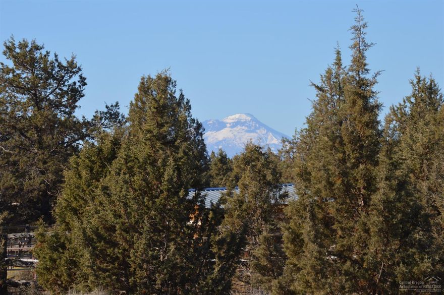 Mountain top views from multiple building sites on this 5.64-acre lot near the entrance of Crooked River Ranch. Few lots available in this area, at this price! Power/water available at the road. Obtain septic approval near your favorite building site! Enjoy the Crooked River Ranch amenities, such as our 18-hole golf course, our disk golf course, tennis & pickleball courts, riding arena, miles & miles of surrounding public lands for horseback riding and hiking, riding area, walking paths, ball diamond and park with pavilion. In addition, there are special interest groups for everything from birders and horse-club to car clubs and quilters. Enjoy the holiday spirit and activities that come with small communities. Crooked River Ranch is a place where life-long relationships are made!