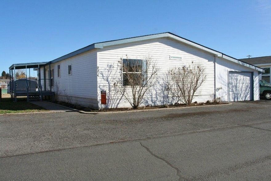 1620 SQFT built in 1997 with New Roof & Skylights, New Carpet, Fresh Interior Paint throughout, Vinyl Windows & Siding, Ready for a New Buyer. Awesome Split Floor Plan with 3 Bedrooms 2 Bathrooms-Large Open Living Room Dining Room Combination-Handy Kitchen with Breakfast Area, Island, Lots of Cabinetry & includes Appliances. Master Suite with Double Closets, French Doors & On Suite Bath-Current. Nice sized Laundry Room, Large Fenced Yard, Super Utility Bldg & Deck. Park Rent @ $353.00 Month Includes Water, Sewer, Garbage See Park Manager #6 for Park Approval Prior to All Offers -This Home Is Sure to Please.