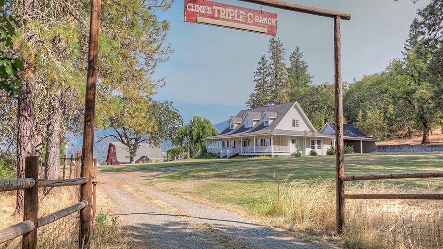 1993 Amazing 2-story farmhouse with wrap-around deck for the leisurely summer days sipping mint juleps! Beautifully built 4 bedroom (Master downstairs) 2 1/2 baths on an amazing 49.87 acres ready to farm to your heart's content. The acreage has hosted long horn steer, cattle and horses in the recent past. Approx 1/4 acre year round pond a short view distance from guest quarters in barn. Spacious patio in back of home for impressive entertaining. Covered parking structure next to patio. Other features are a fenced garden with green house, flower garden, hook-ups for RV parking & a basement below the house to store treasures and canned goods. It is hard to describe the wonders one beholds on this exquisite property. Come see! (Application for Water Rights in process.)