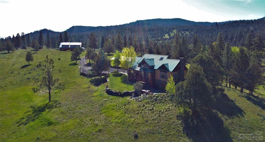 Enjoy the privacy & tranquility of your own mountain paradise! Located in the heart of Oregon, this 414 acre ranch boasts many attributes. A beautiful mortise and tenon timber frame home, a large heated shop with exquisite 3 bedroom guest quarters. An excellent population of wildlife including elk, deer, antelope, turkey, waterfowl, raptors, and boundless other critters. Your guests are happy to catch large rainbow trout from the reservoir or visit the creek for a shot at a native red-band cutthroat.