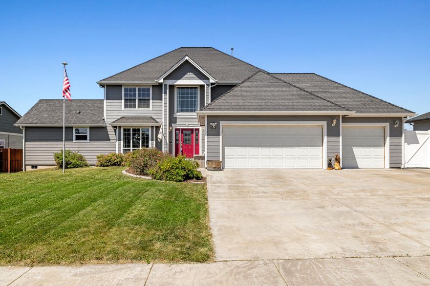 Charming 5-Bedroom Home in the Henley School District! This spacious 2,579 sq ft residence features a versatile main-level addition with a private bath, kitchenette sink, mini-fridge, and a dedicated porch—ideal for a main-level primary suite or guest suite. The home includes a living room and a family room, plus a formal dining room, a kitchen with two wall ovens and a pantry.  The upper level has 4 bedrooms and 2 baths. This  large lot offers a view of Mt  Shasta and benefits from open land at the back for added privacy.  Extras include a 12x16 shed, a finished 3-car garage, and an expansive covered patio with a relaxing hot tub. Additional conveniences are ample space for RV parking, vinyl fencing, a durable roof, a gas fireplace, and central heating and A/C for year-round comfort. Schedule your tour today.