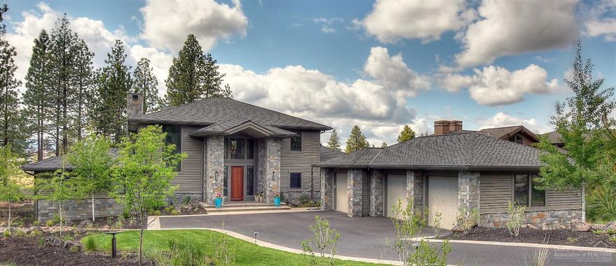 Exquisite home w/Mtn. and Fairway views on cul de sac. Great room with gorgeous stone fireplace and floor to ceiling windows offers lots of natural light. Gourmet kitchen w/Viking range, extensive cabinetry, wine refrigerator, pantry. Master suite w/fabulous bath on main, plus den/office and bonus media room w/views & fireplace. Wine room, large laundry w/pet wash. Two guest suites, second laundry upstairs. 4300 sq. ft. Large paver patio, built in BBQ. Over sized triple garage. Smart home-call for details.