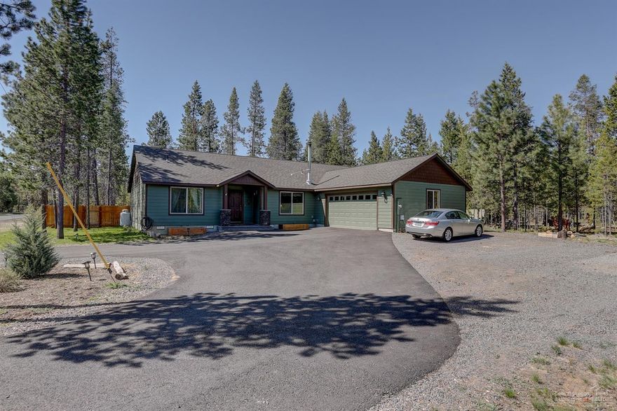 Call this fully fenced and protected corner lot home in OWW your very own. This community has a private sewer and water system. This single story home has been well maintained home with upgrades throughout. Stretch out and enjoy all that this Central Oregon home has to offer, crafted to fit your lifestyle. Interior upgrades including a spacious great room floor plan, giant master suite, oversized garage, open kitchen, solid slab countertops, double oven & soft close drawers. Outside you'll discover a circular blacktopped driveway with home facing north away from any lights, RV septic clean out, 30 Amp circuit for RV hook up, prewired with 50 amp circuit for hot tub, and a large 6' cedar fenced back yard with storage shed and gate access. Too many upgrades to list.