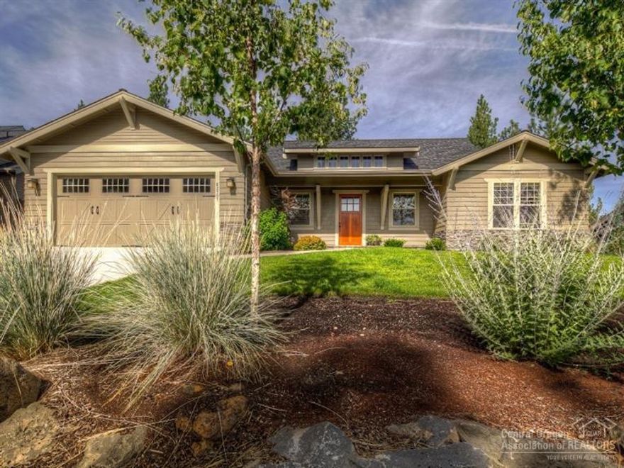 Beautiful single level home on a large treed lot in Three Pines. Wonderful floor plan. Great room with vaulted ceiling & lots of windows, spacious entry & utility room, large den. Luxurious Master suite w/separation from guest suite. Beautiful hardwood floors, solid granite counters, premium appliances, large closet & pantry. Paver decks front & back, fully fenced back yard with sunny exposure.