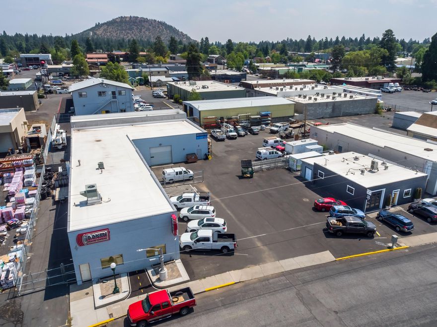 Perfect opportunity for owner/user with hold for redevelopment in Midtown Bend, an area of new development, w/ State, City, & Private Incentives.  8137 square feet, additional fenced/secured yard space, warehouse w/ rollup door, large showroom & reception, three private offices, conference room w/ kitchenette, 2 year new membrane roof, minutes to Downtown. Many additional improvements & upgrades, .72 acre (w/ lot line adjustment), 43 parking spaces + street, & ME Zoning (Mixed Employment).  Located in the Opportunity Zone, the Enterprise Zone, and the Bend Central Zone.