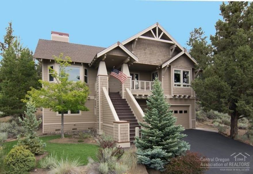 On top of the Butte with expansive mountain views! This stately NW Craftsman style home is located at the end of a quiet street, backing to city & private land. Reverse living plan features master ensuite w/ private den & fireplace, guest room & office on upper level & two bedrooms on lower level. Amenities include lovely hardwood floors, 3 way fireplace in the main living area, crown molding, lg. tandem 3 car garage, plenty of storage, Central A/C & a spacious, private back deck perfect for entertaining!