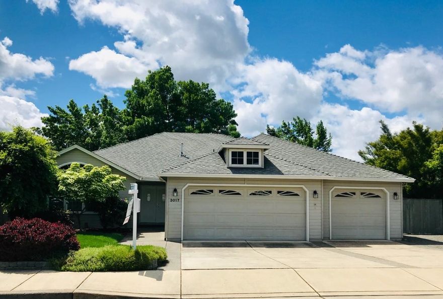 Wonderful East Medford home w/ 3 car garage and large gated RV Parking! Quiet neighborhood, close to everything, great space, and quality construction. Double entry doors lead you into this very well maintained, naturally light and bright, one owner home. The living room is vaulted w/ a cozy gas fireplace and is open to the formal dining room to make entertaining a breeze. The kitchen features white cabinetry, quartz countertops, tiled backsplash, pull out shelves, pantry, island and breakfast room with access to the private backyard patio. The family room is adjacent to the kitchen/breakfast room. The master suite is also vaulted, w/ a walk-in closet, shower, dual vanities and access to the backyard. The additional 3 bedrooms are nicely sized. Laundry room has ample cabinetry and leads to the garage. Bathrooms and kitchen have all been updated in the last 5 years. 8x10 storage area in attic. Gorgeous mature landscaping with timed sprinklers