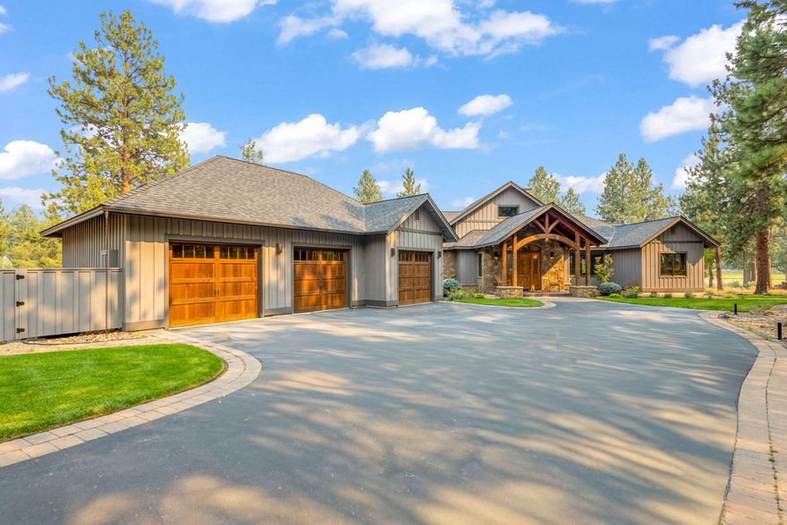 Northwest lodge-style single level home with lake frontage at Aspen Lakes Golf Estates. Interior features: Large great room with high vaulted ceilings, beam work, floor to ceiling rock fireplace, huge windows and a big view of the lake; True ''entertainers'' kitchen with enormous island, double oven, 6 burner cooktop, large pantry, and an abundance of storage space; Large primary bedroom with 2 walk-in closets, walk-in shower, double vanity, private toilet; Two additional en-suites at opposite end of the home; Office/sitting room; Wood style tile, solid wood doors, and casework throughout; 10' plate height where non vaulted; 8' x 14' lap pool; Oversized laundry room. Exterior features: 1183sf garage with 3 garage doors, mechanical room, additional workroom and extended length at one end; Huge paver patio with outdoor fireplace in the rear of home with covered roof. Property owners enjoy access to the community clubhouse with an exercise room, outdoor pool, hot tub, and tennis courts.