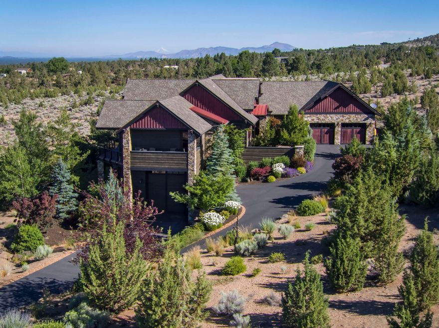 Stunning Cascade Mountain Views from NW Style home on 1.79 acres in Brasada Ranch. Custom 3250 sq ft home has unique, quality finishes throughout. Open floorplan with main floor living includes: great room with 18 ft. hand painted ceilings, gas fire place, chef's kitchen, dining area, breakfast bar, pantry, outdoor kitchen, master suite with soaking tub, tile shower, walk-in closet and hot tub on he deck, office/3rd bedroom and powder bath. Guest Suite, temperature controlled wine room, utility room with dog wash, attached two car garage and RV garage with full hookups, work bench and storage. Property is one of the largest lots in the neighborhood landscaped with mature trees and room to build a casita because two lots were combined to protect the views. Enjoy all of Brasada Ranch Amenities Athletic center with pools, 18-hole golf course, kids activity center, equestrian center, restaurants, general store, trails and tennis courts.