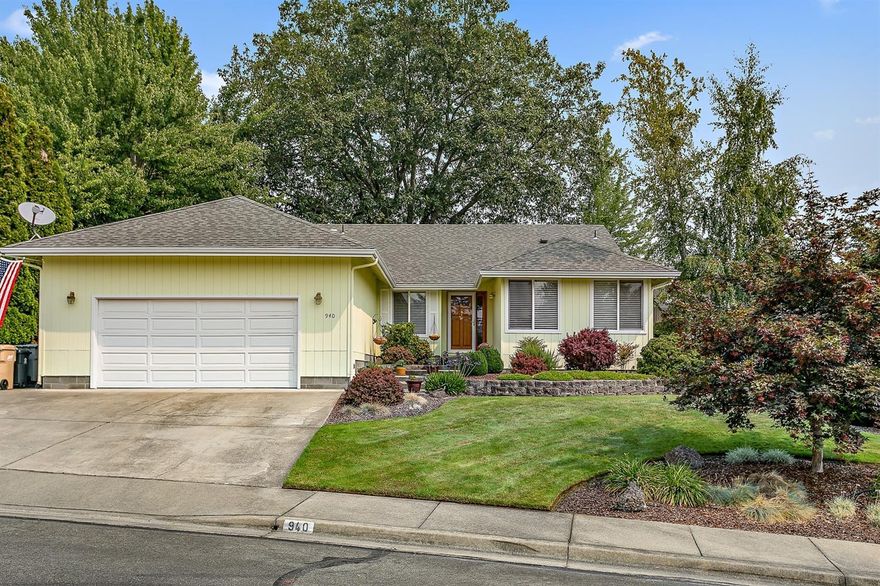 Beautiful home in NW Grants Pass has all the amenities you've been searching for. Featuring an immaculate 3 bedroom, 2 bath home with 1951 sf. The cook will love this kitchen with tile counters and floors, 5 burner natural gas stove, pantry, newer appliances, snack bar, and nook. Sunny and bright living room with formal dining. Great room has vaulted ceiling, free standing gas stove and slider to the patio. Spacious master suite vaulted 14 ft. ceiling, plant shelves, large walk-in closet, dual sinks, tile counter and shower and slider to the patio. Beautiful wood floors, skylight, newer roof and HVAC system. Laundry room with utility tub and cabinets. An attached two car finished garage with shelving. Low maintenance .19 of an acre in a cul-de-sac location. Convenient to schools, shopping and hospital. District 7 schools.