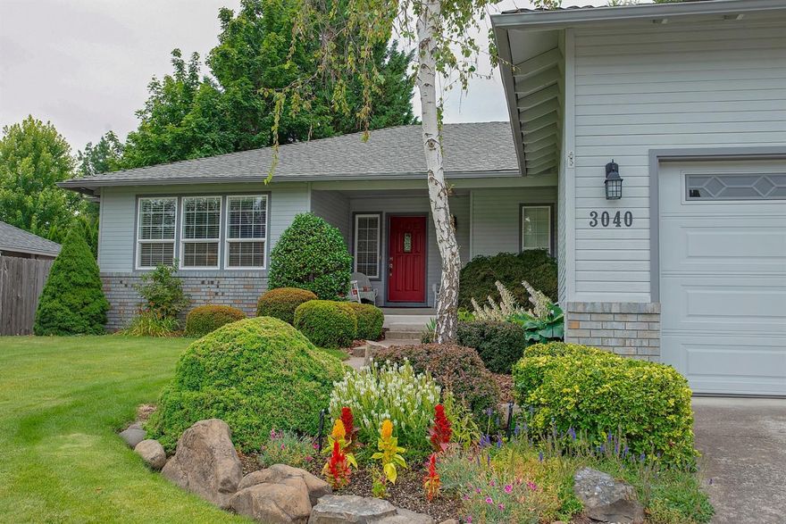 Fantastic new PRICE REDUCTION!! Welcome home to this beautifully maintained & updated home in the Lone Pine school district! Start your tour w/ the perfect coffee sipping front porch & water feature w/ new pump & liner. As you enter the home you will find newer upgrades (2017) that include carpet in living & dining, wood plank laminate flooring throughout hallway & bedrooms, interior paint, doors & hardware, tile in kitchen & bonus room, 2nd bathroom granite, sink & toilet & washer & dryer. Well appointed floor plan includes gas fireplace, spacious bedrooms, master w/walk in closet, remodeled bath & crown molding, large windows & an extra bonus area off of the kitchen. Brand new 50 gallon water heater, dishwasher & newer appliances are all included! The beauty continues as you enter the backyard w/ covered patio, newly painted deck & hot tub! Mature trees & shrubs surround the peaceful & tranquil backyard. There is abundant space on both sides of the home for planter boxes and storage