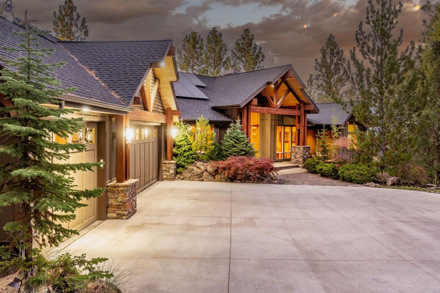 This very private executive home exudes the timeless Northwest architecture of Norman Building & Design. Perched on coveted Awbrey Butte, an impressive entry greets you w/ a massive prow, paver patio, trickling water feature & oversized wood front door.  Once inside the foyer, the stunning great room boasts a grand Chief Joseph rock fireplace, vaulted cedar ceiling, beams, hardwood floors & Cascade Mountain views.  Chefs love the kitchen, commercial refrigerator, Dacor ovens & 5-burner gas cooktop, island, dining room & a sizable deck, perfect for entertaining.  A main floor office, laundry & primary bedroom, en-suite bath includes jetted soaking tub, double vanity, enclosed toilet & generous walk-in closet.  Lower level enjoys a family room, 4 bedrooms, 2 baths & access to a private patio to enjoy the .87 acre lot, immaculate landscaping & 2nd water feature.   A new automated heated driveway, solar panels, 3-car garage wired for electric car charger make this luxury home complete.